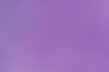 Purple color abstract plaster empty wall blank texture stucco background.