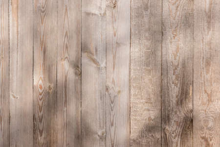 Old vertical boards dirty light fence texture, wood pattern plank vintage background.の写真素材