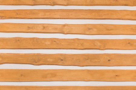 Wooden boards abstract interior plank design on background of white wall texture.