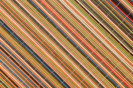 Multicolored Decorative Braided Wood Stand Linear Wicker Striped Shutter Background Blinds Design.