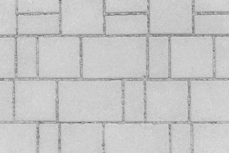 Gray sidewalk tile street stone city road abstract urban pattern design texture paving background.の写真素材