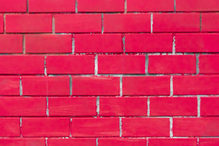 Old red paint brick wall texture stone color background rough.の写真素材