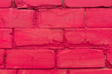 Old red paint brick wall texture stone color background rough.