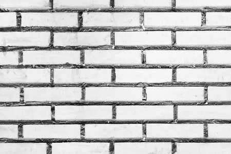 White brick wall texture old stone light background.の写真素材