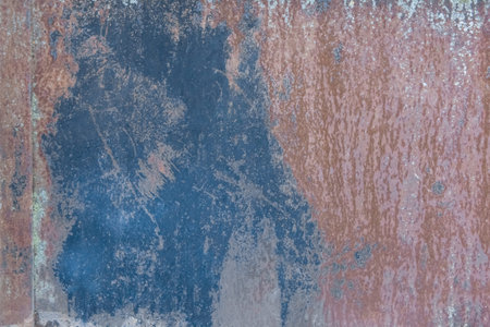 Blue paint old spots traces pattern outdated on the texture of rusty metal background steel grunge...