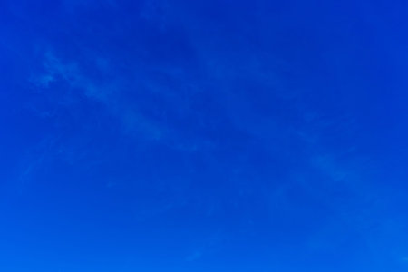 Clear cloudless dark blue sky background weather nature atmosphere.の写真素材