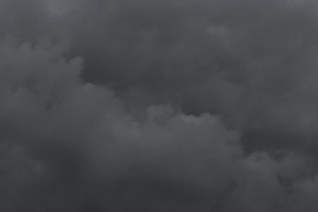 Dark gray clouds sky rain clouds bad weather nature background.の写真素材