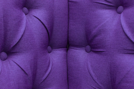 Purple leather upholstery sofa corner pattern button design furniture style decor texture background decoration vintage material.の写真素材
