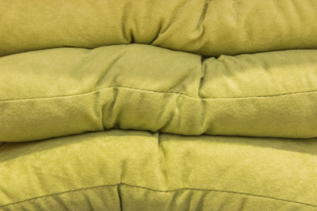 Fabric green verdant material color textile object vintage sample background design, close up.の写真素材