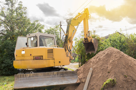A bulldozer is digging on outdoors in an industrial site. excavation.の写真素材