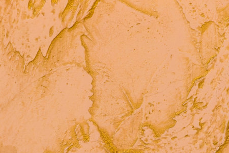 Orange-brown wall texture with abstract background grunge pattern.