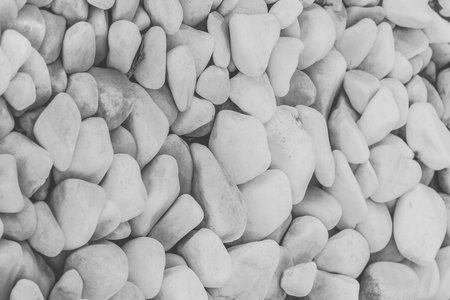 White sea stones texture light rock background pebble.の写真素材