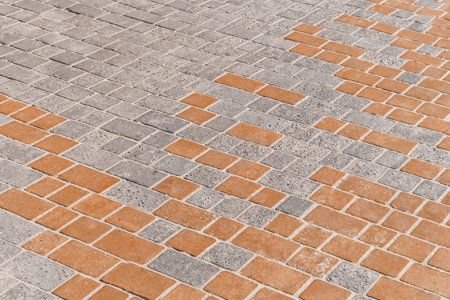 Brown and gray paving tile floor mosaic urban texture street road background.の写真素材
