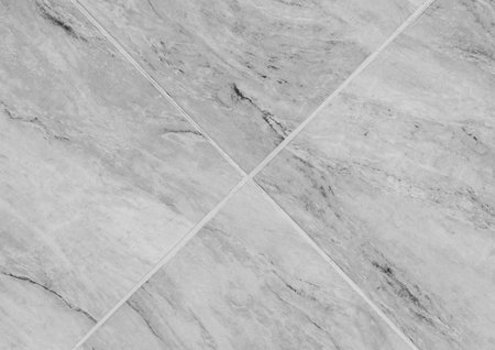 Diagonal lines ceramic floor tiles with abstract stone gray pattern surface gray texture background.の写真素材