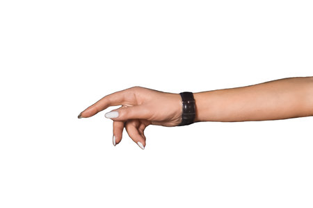 An outstretched woman's hand presses the girl's hands with her fingers against the background white isolated.の写真素材