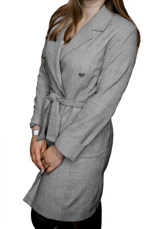 Girl posing in gray business suit, fashion and style of clothing on white background isolated.の写真素材