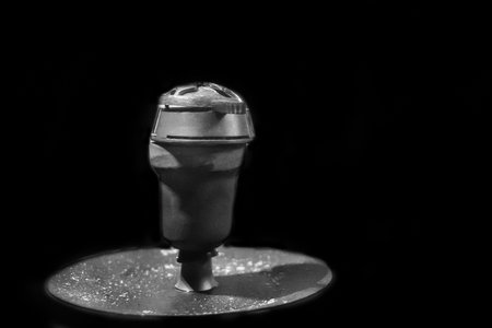 Clay bowl close-up gray object on a dark background.の写真素材