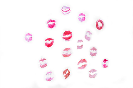 A group of many lip marks on a white background.