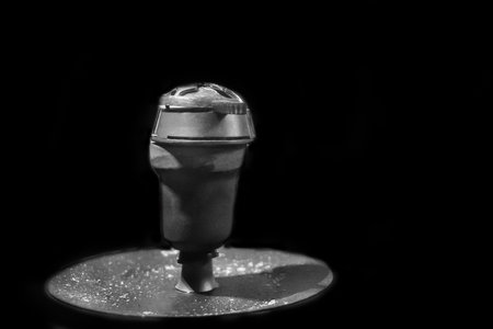 Clay bowl close-up gray smoking object on a dark background.の写真素材