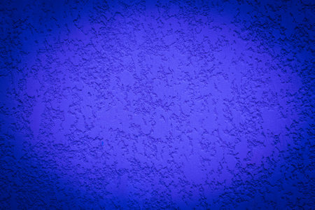Blue paint stucco wall plaster cement surface concrete abstract pattern grunge structure background backdrop design vignette.の写真素材