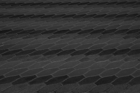 Black Paving Stone Floor Tile Street Pattern Texture Background Mosaic Urban Road City Abstract Flooring Design.の写真素材