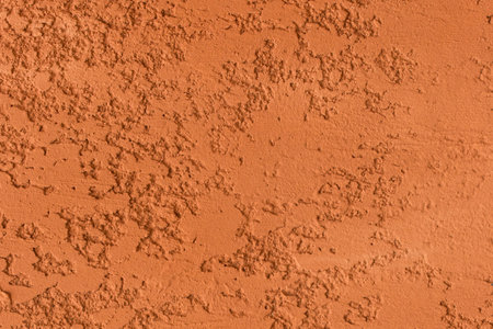 Abstract Pattern Wall Cement Orange Brown Concrete Surface Texture Background Plaster Stucco Backdrop Structure Rough.の写真素材