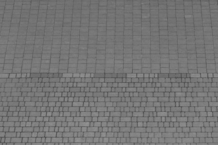 Gray floor tile stone texture surface street city background road pattern gray abstract.