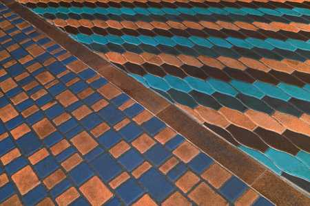 Two Kinds Paving Colored Tiles Dividing Border Curb Mosaic Stone Street Road City Texture Background Color.の写真素材