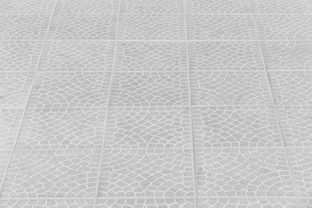 Light White Paving Slabs Abstract Pattern City Road Surface Mosaic Street Texture Background.