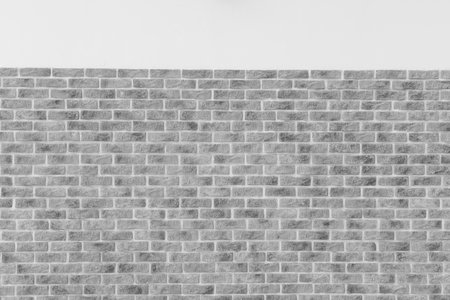 Gray brickwork masonry brick wall texture background facade backdrop architecture structure exterior grey.の写真素材