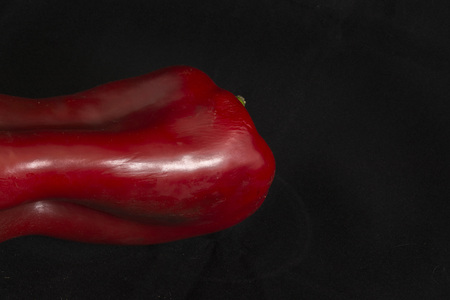 fresh chili pepper on black background in studioの写真素材