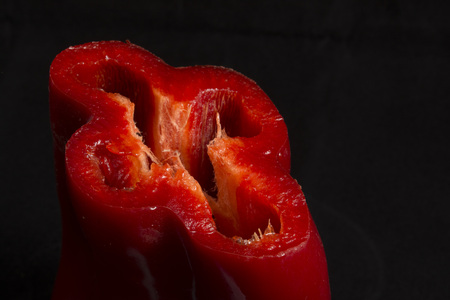fresh chili pepper on black background in studioの写真素材