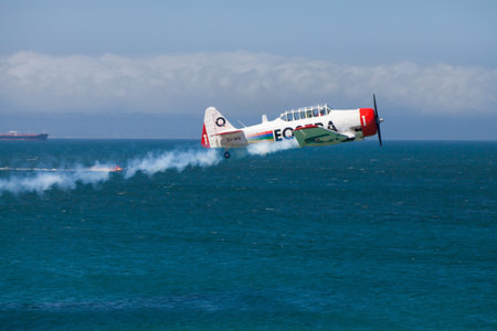 Aeroplane taking off over ocean