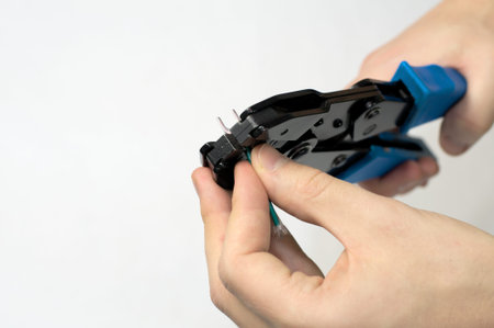 Engeneer hands fixing clemma with wireの写真素材