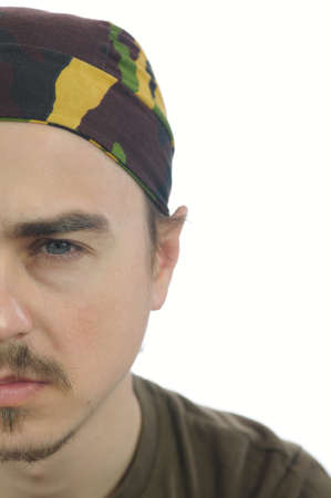 Caucasian Man half face isolated white backgroundの写真素材