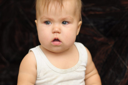 Portrait of nine month baby in tears