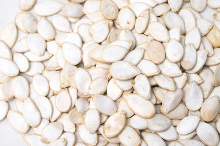 white pumpkin seeds as a snack foodの写真素材