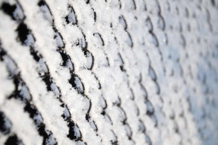 winter hoarfrost on the braided iron fenceの写真素材