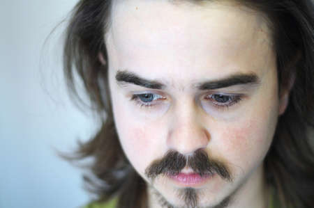 Face portrait of thinking man with beardの写真素材