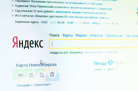 NOVOSIBIRSK, RUSSIAN FEDERATION - NOVEMBER 11, 2014: Photo of Yandex homepage on a monitor screen.のeditorial素材