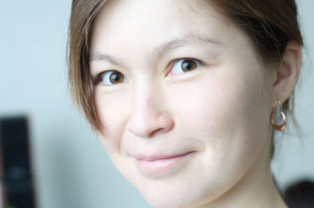 Beautiful smiling asian girl face portrait elegant and beautiful without makeup, raw style, candid real peopleの写真素材