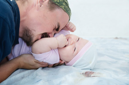 Father playing with baby girl daughter. Happy family portrait