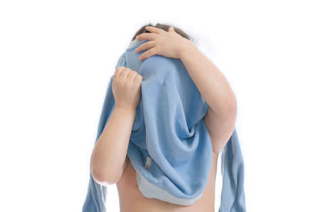 child wearing cloth. kid learning to wear blouse and gathering to kindergarten isolated on white backgroundの写真素材