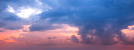 Beautiful sunset sky above clouds with dramatic light