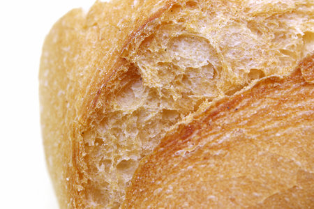 close-up a slice of organic breadの写真素材