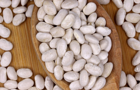 organic dried white beans on a background