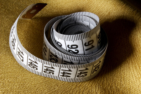 colored measuring tape on background