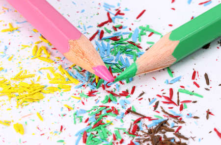 colored pencils and sharpener residuesの写真素材