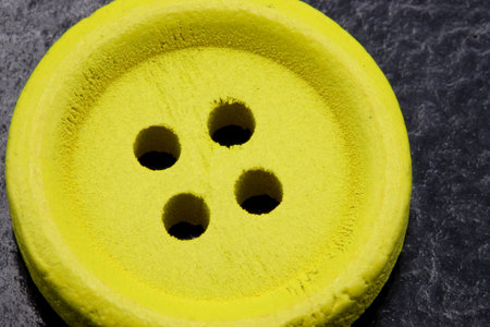 colored buttons on a black background