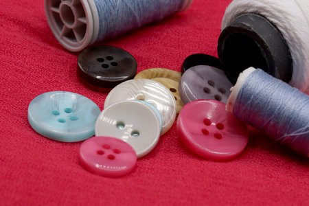colorful buttons on fabric background